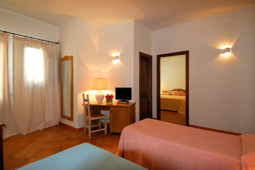 Boutique Hotel Sant'Andrea & Relais San Pantaleo Pokoj fotografie