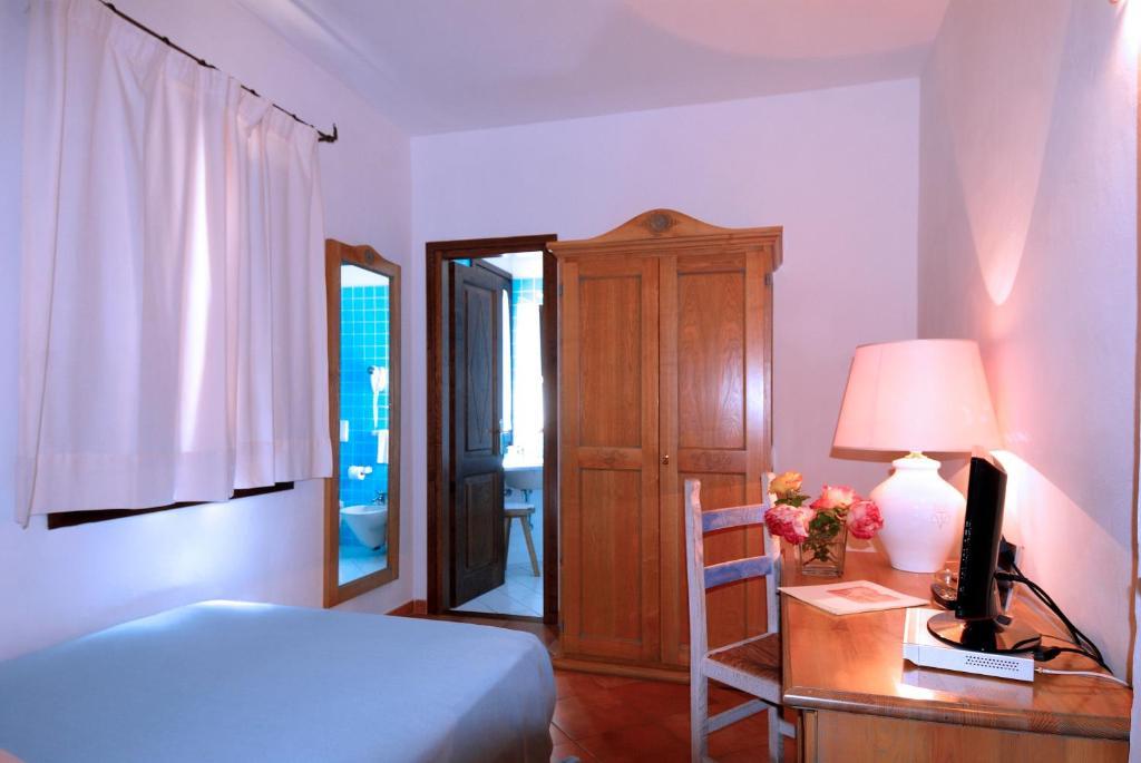 Boutique Hotel Sant'Andrea & Relais San Pantaleo Pokoj fotografie
